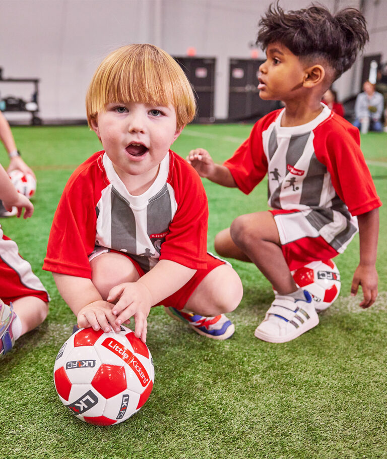 a group of kids in sports uniforms