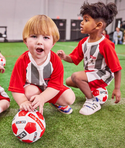 a group of kids in football uniforms